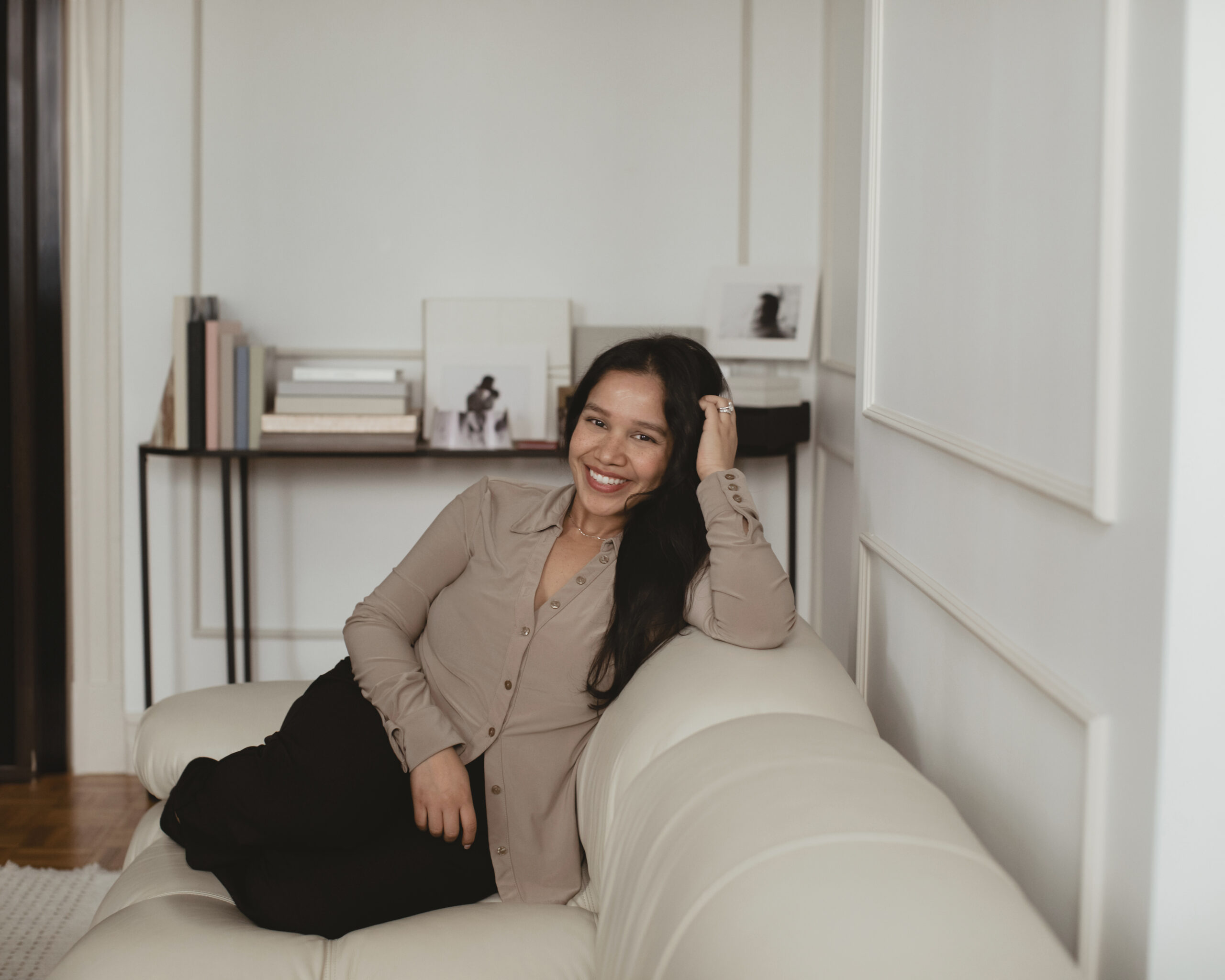 rosie richards sitting on a couch